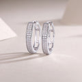 Double-row pavé moissanite hoop earrings in platinum-plated sterling silver