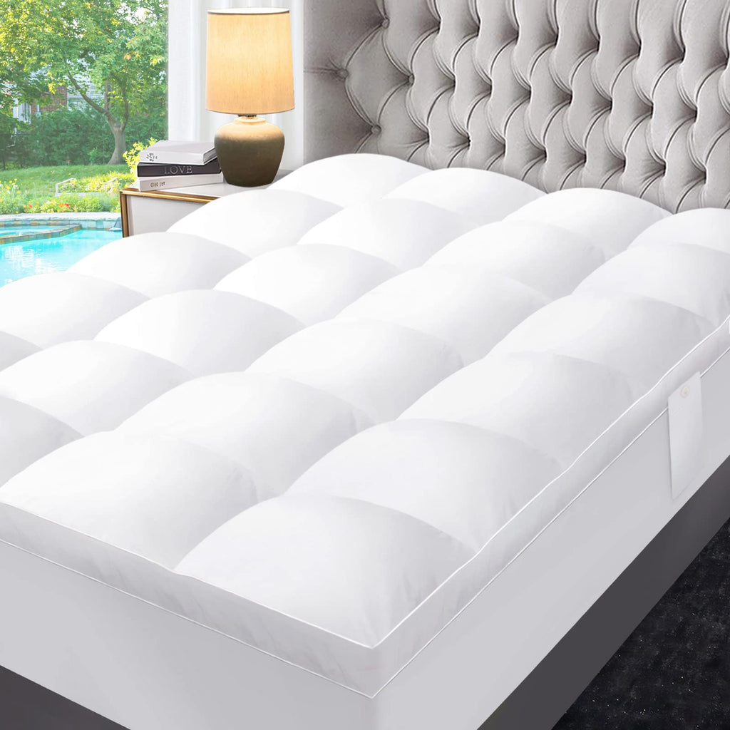 Quilted mattress topper on a bed