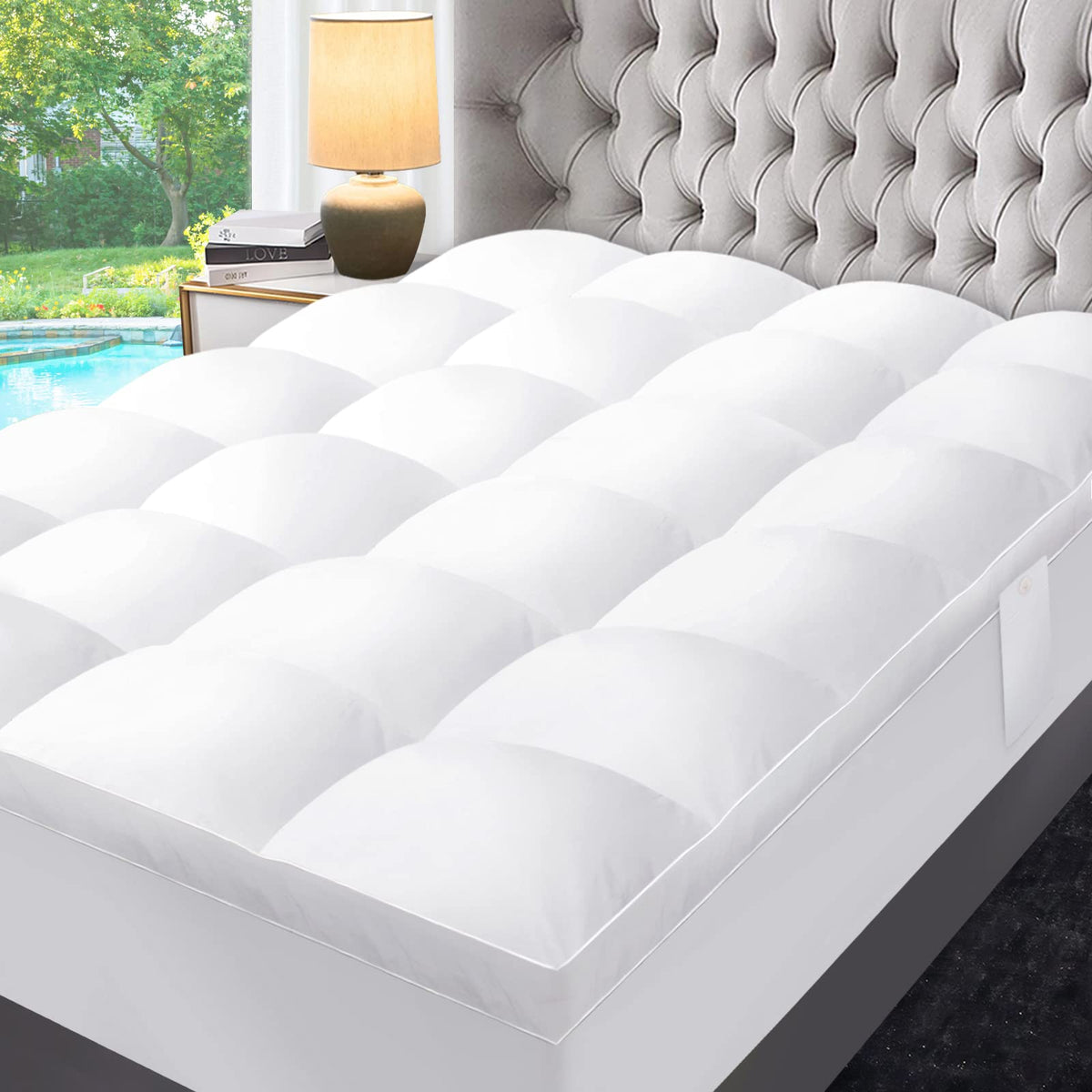 Quilted mattress topper on a bed
