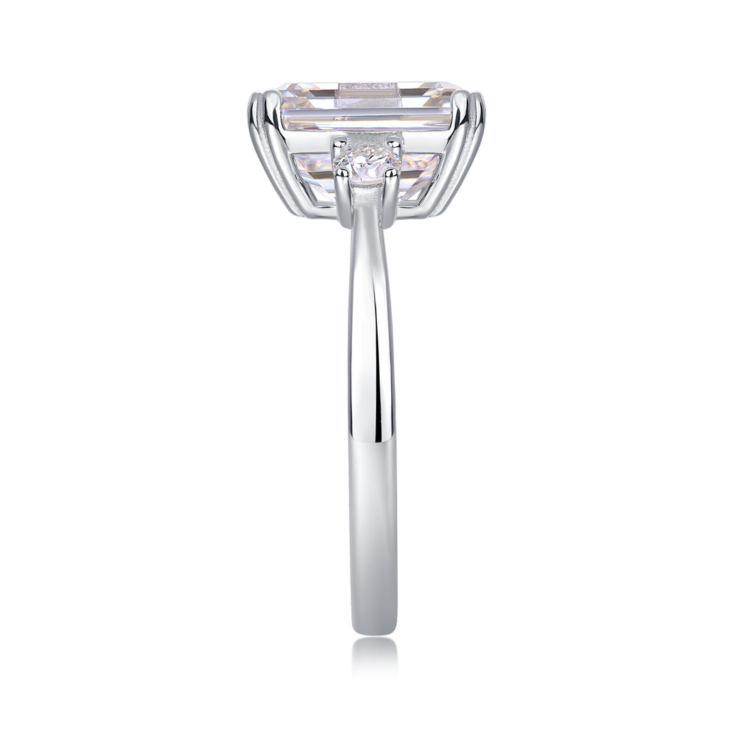 Emerald-cut moissanite three-stone ring, side view