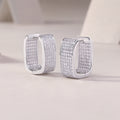 Pavé moissanite huggie earrings, side view
