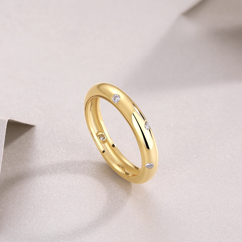 Gold dome band with scattered moissanite stars