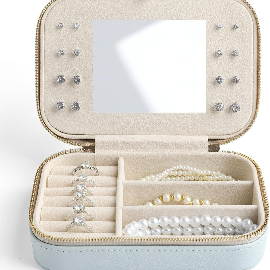 Travel jewelry case with the mirror lid open