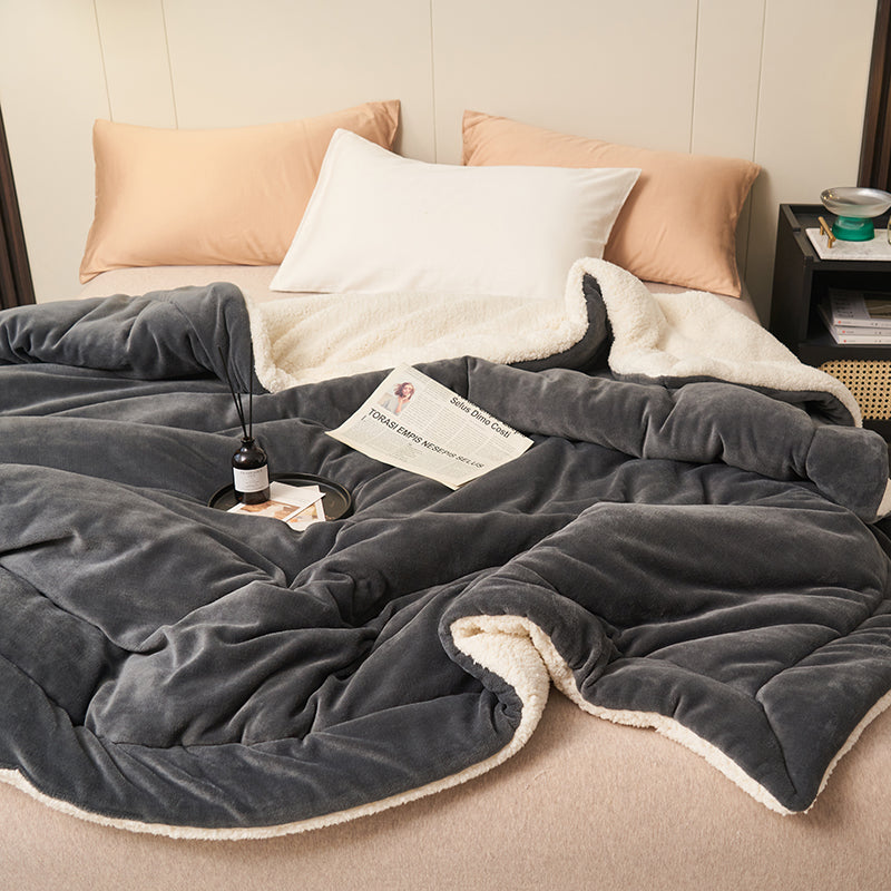 Reversible sherpa throw in dark grey