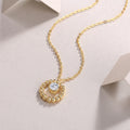 Gold beaded halo pendant with a 0.5 ct moissanite on a fine chain